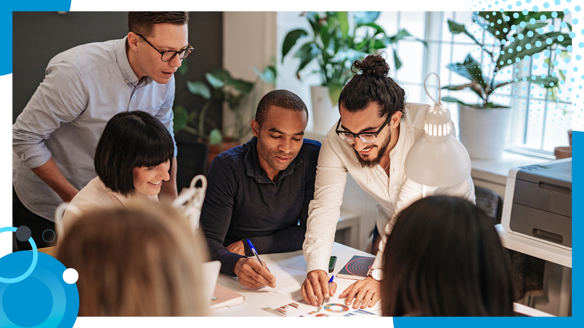 a photo of a team colloborating for a project