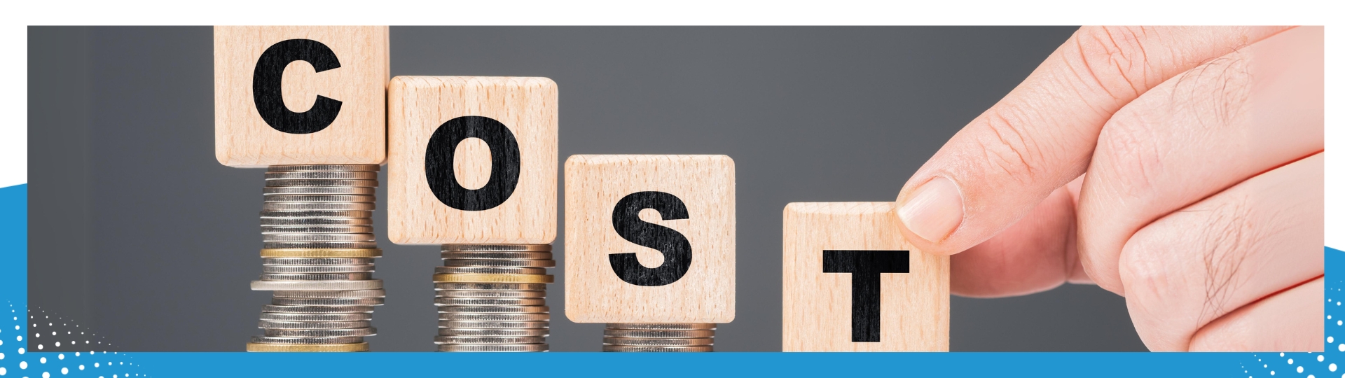 Close-up image of wooden blocks spelling "COST" placed on stacks of coins, symbolizing financial considerations and cost-saving strategies.