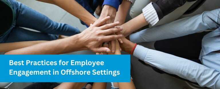 A diverse team uniting hands in a show of teamwork and solidarity, symbolizing effective employee engagement in offshore environments.