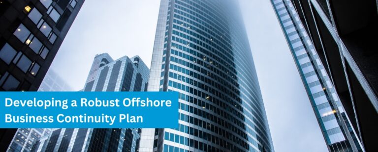 A towering modern office building surrounded by other skyscrapers, partially shrouded in mist, representing the importance of foresight and planning in developing a robust offshore business continuity plan.